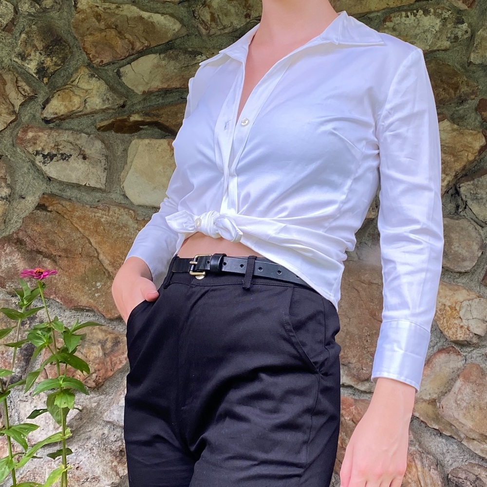 Crisp white button down blouse.